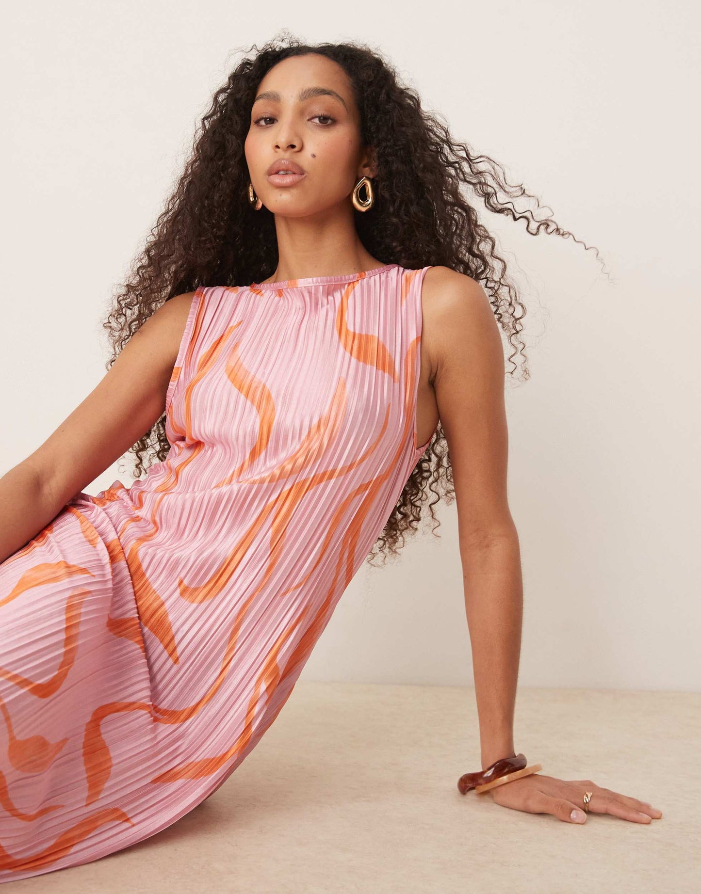 ASOS DESIGN plisse sleeveless midi dress in pink swirl print