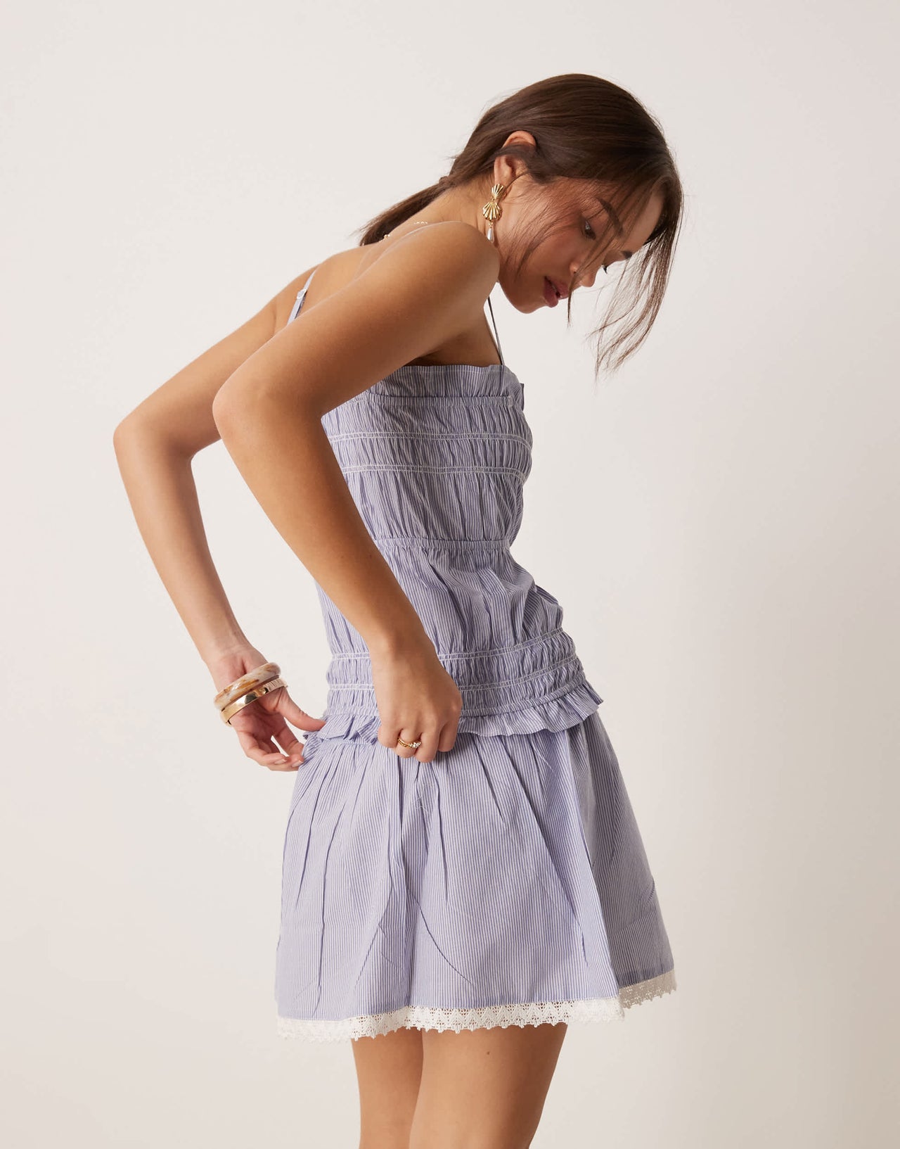 Esmee Exclusive tie front mini beach skirt with trim detail in blue and white stripe