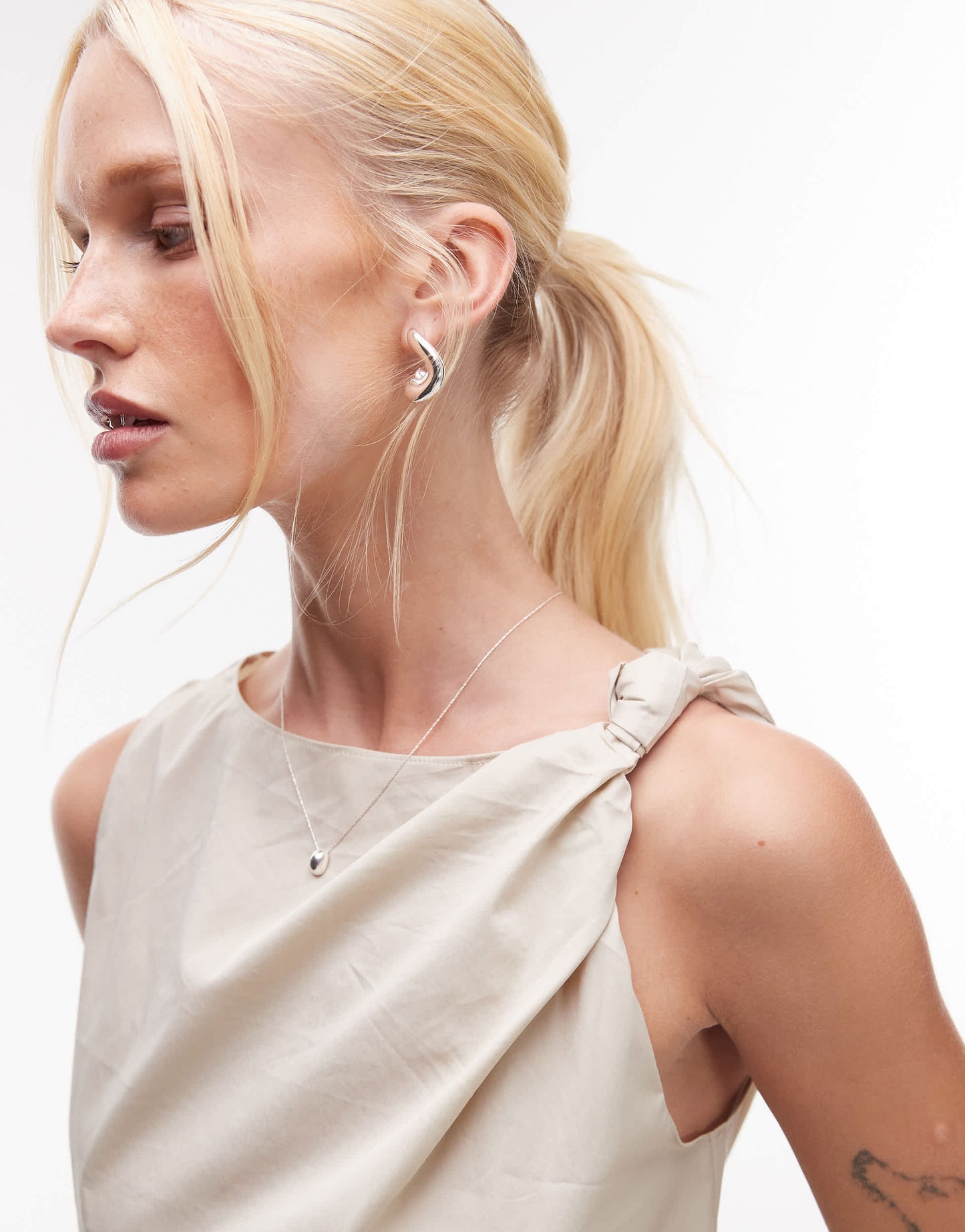 Mango knotted shoulder asymetric sleevless top on cream