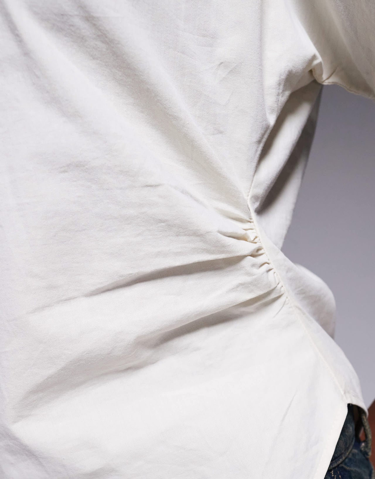 ASOS DESIGN asym ruched detail woven tee in cream