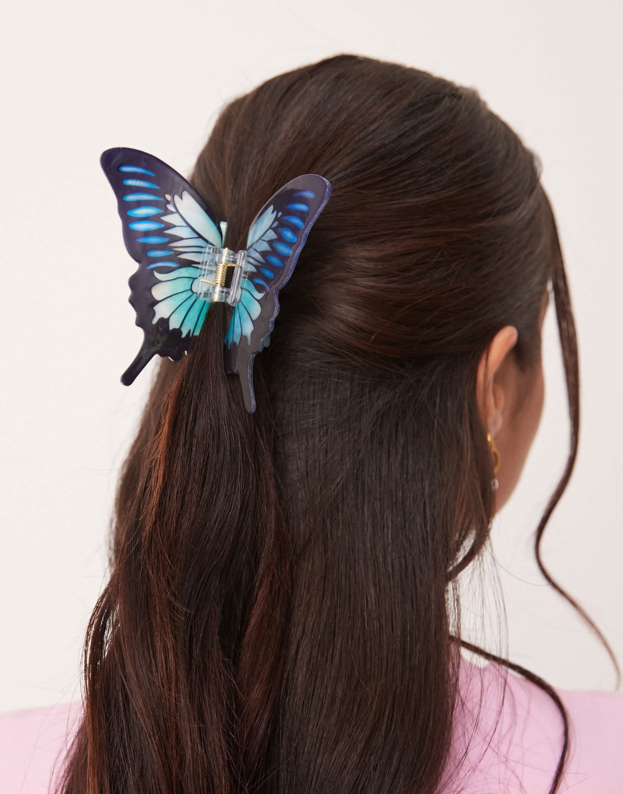 ASOS DESIGN butterfly hair claw in blue multi