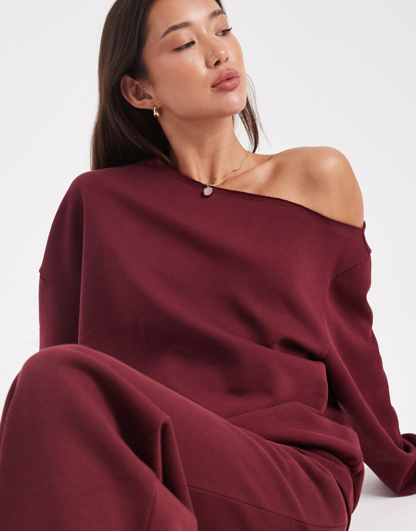 ASOS DESIGN off shoulder brushback sweatshirt in burgundy