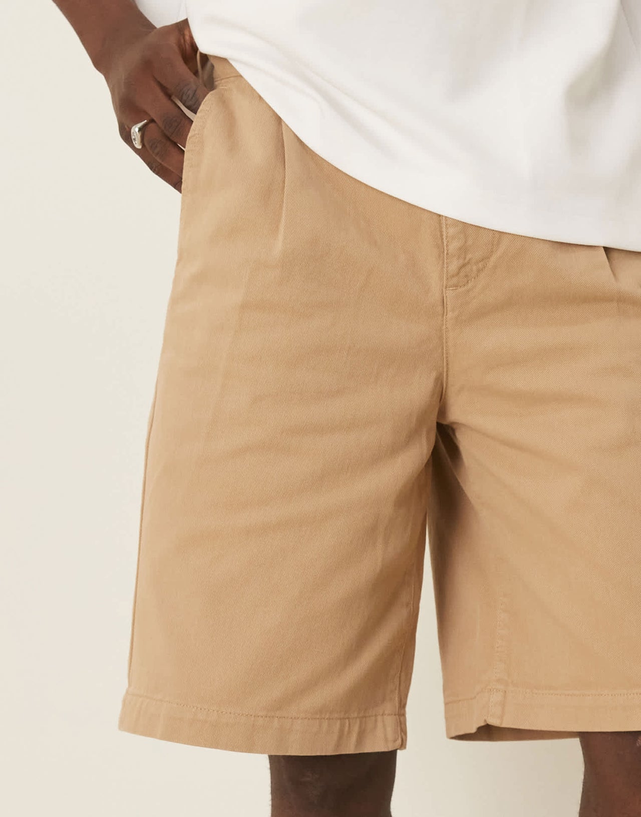 ASOS DESIGN long length pleated shorts with double darts in beige