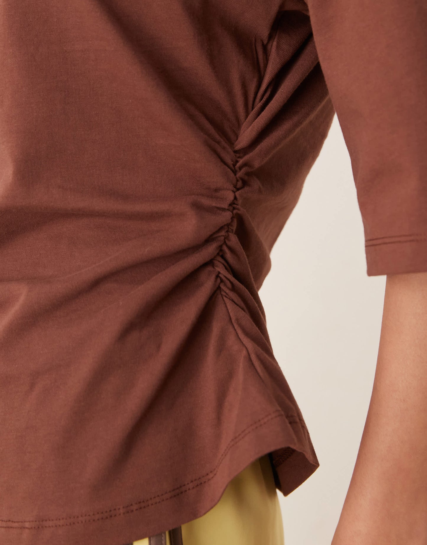 ASOS DESIGN cinched tee with shoulder pads in brown