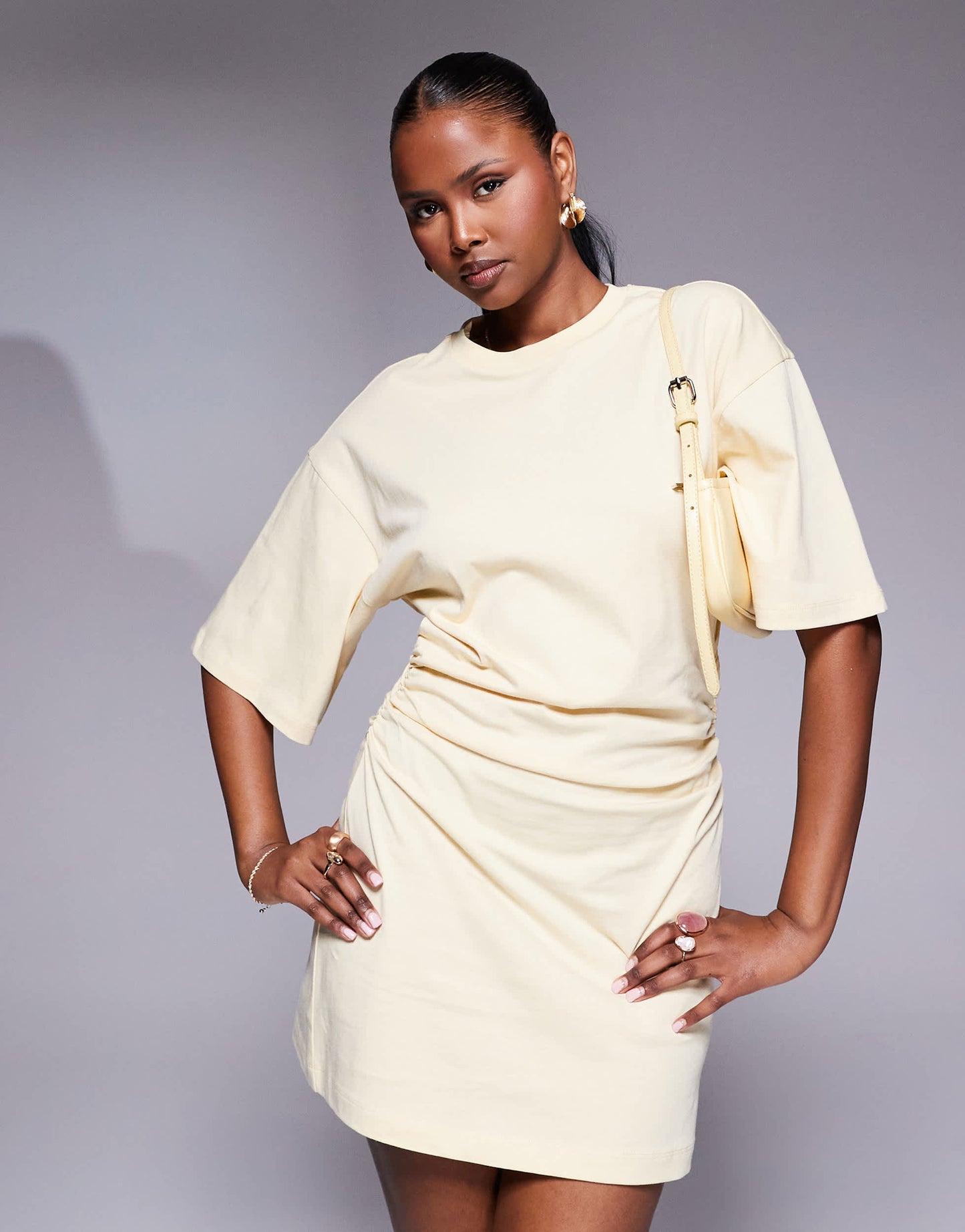 ASOS DESIGN cinched t-shirt mini dress with shoulder pads in buttermilk