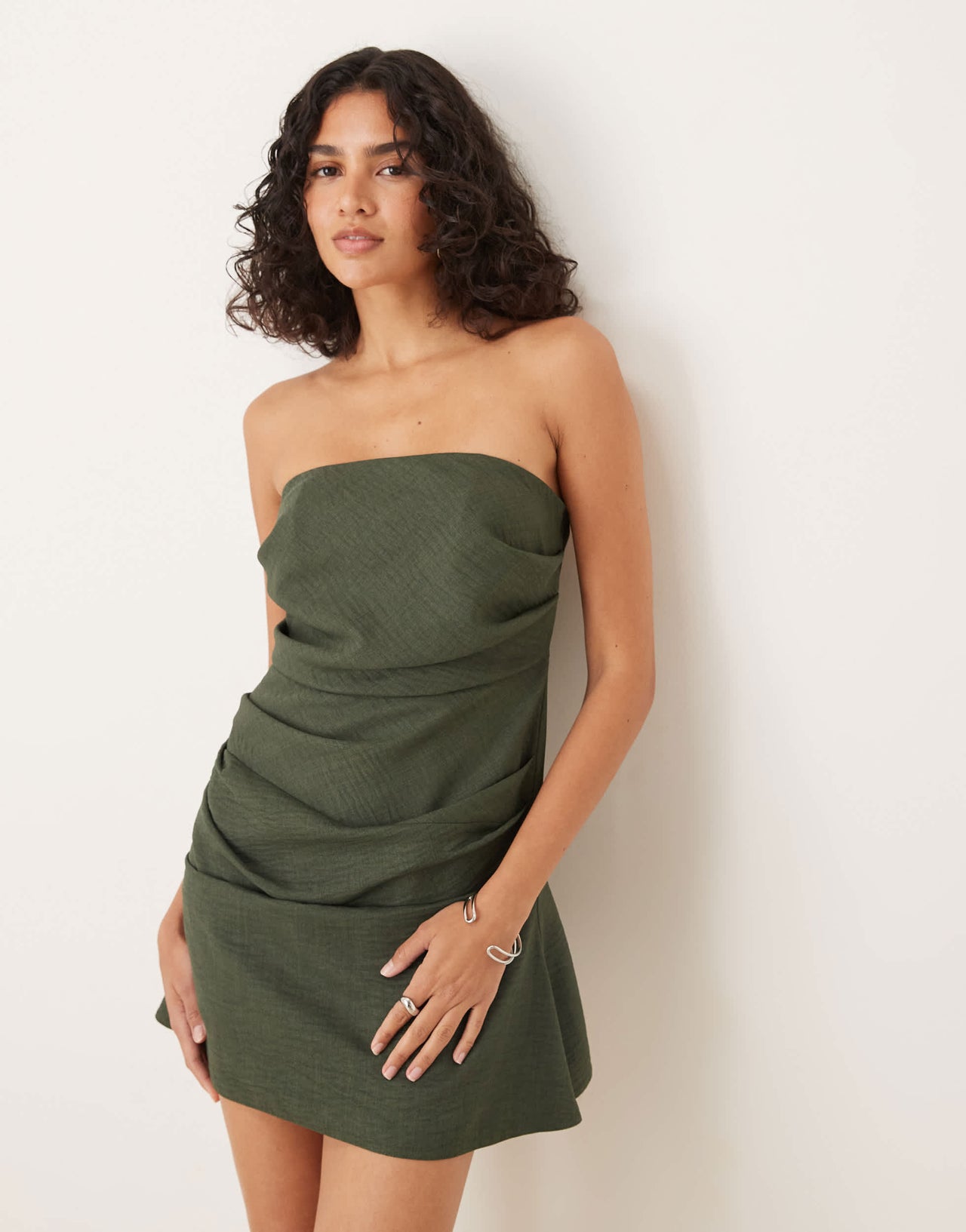 ASOS DESIGN manipulated bandeau mini dress in dark green
