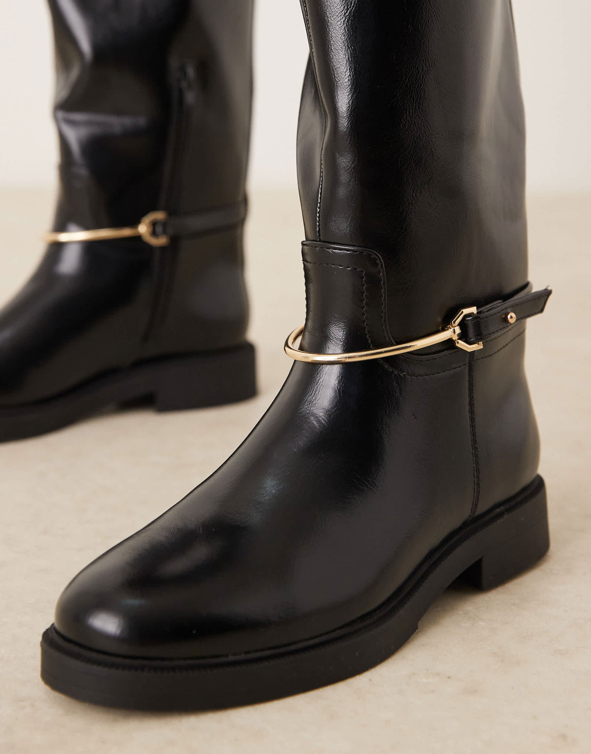 ASOS DESIGN Wide Fit Cole flat riding knee boot in black with trim