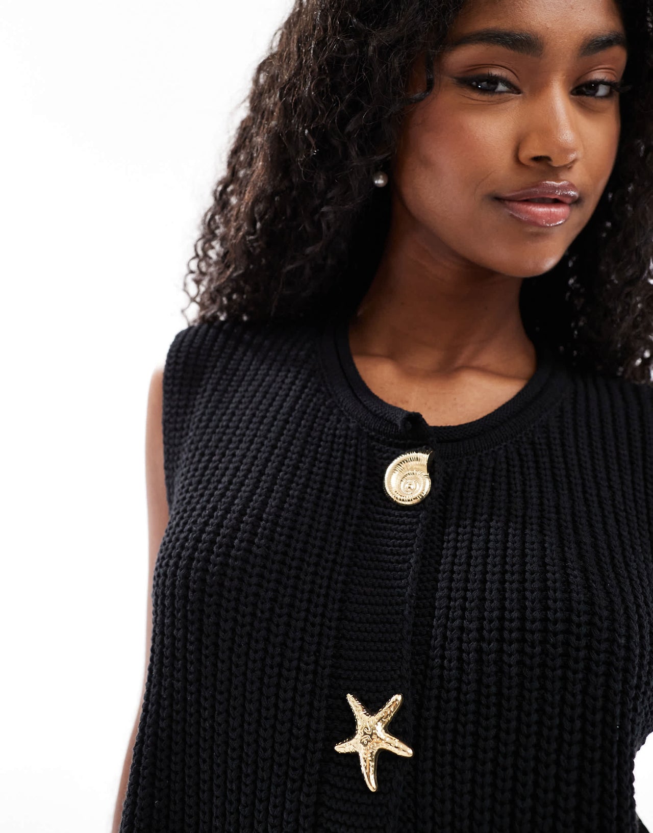 ASOS DESIGN knitted boxy waistcoat with multi shell buttons in black