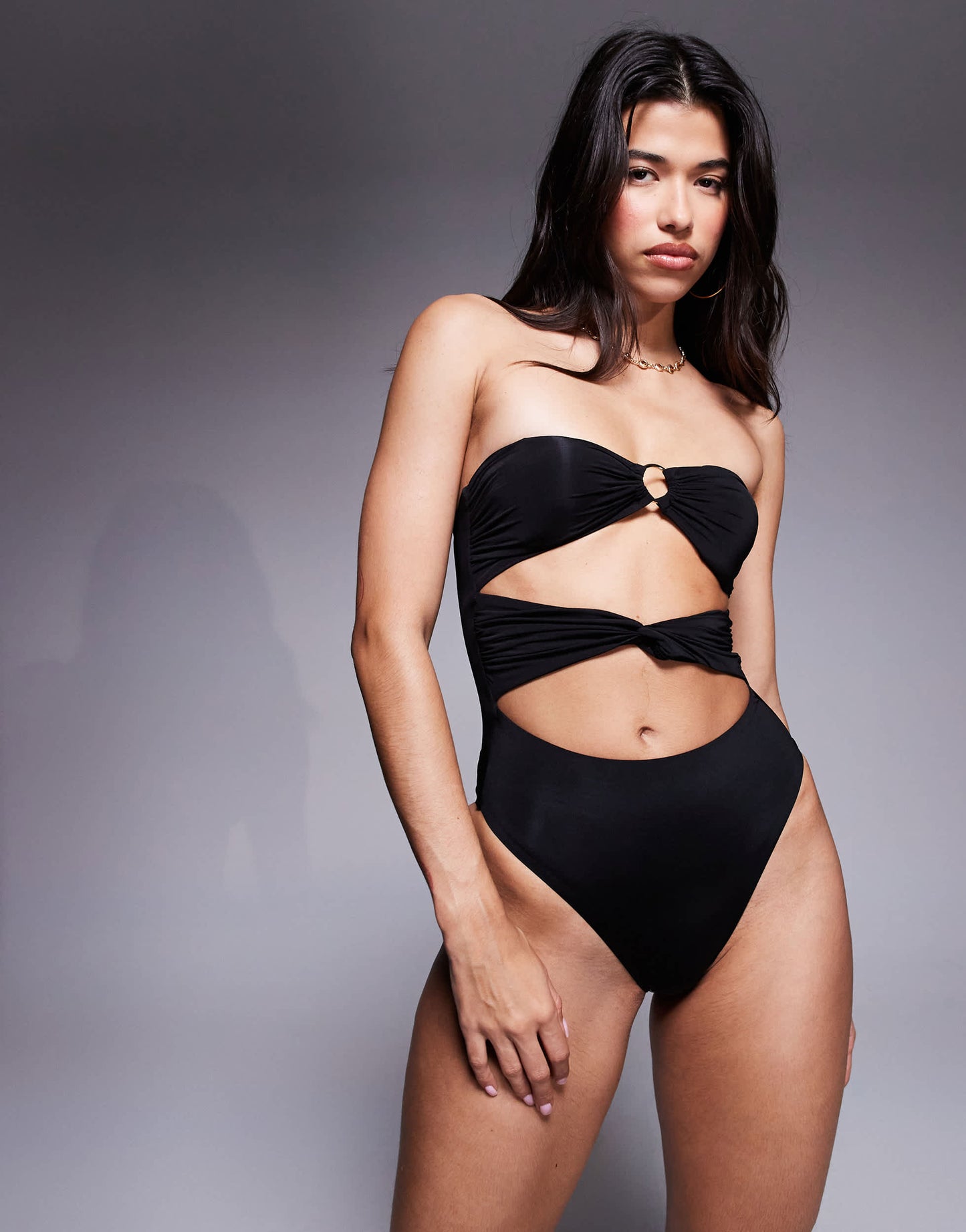 ASOS DESIGN Brooke twist front bandeau swimsuit with removable pads in black