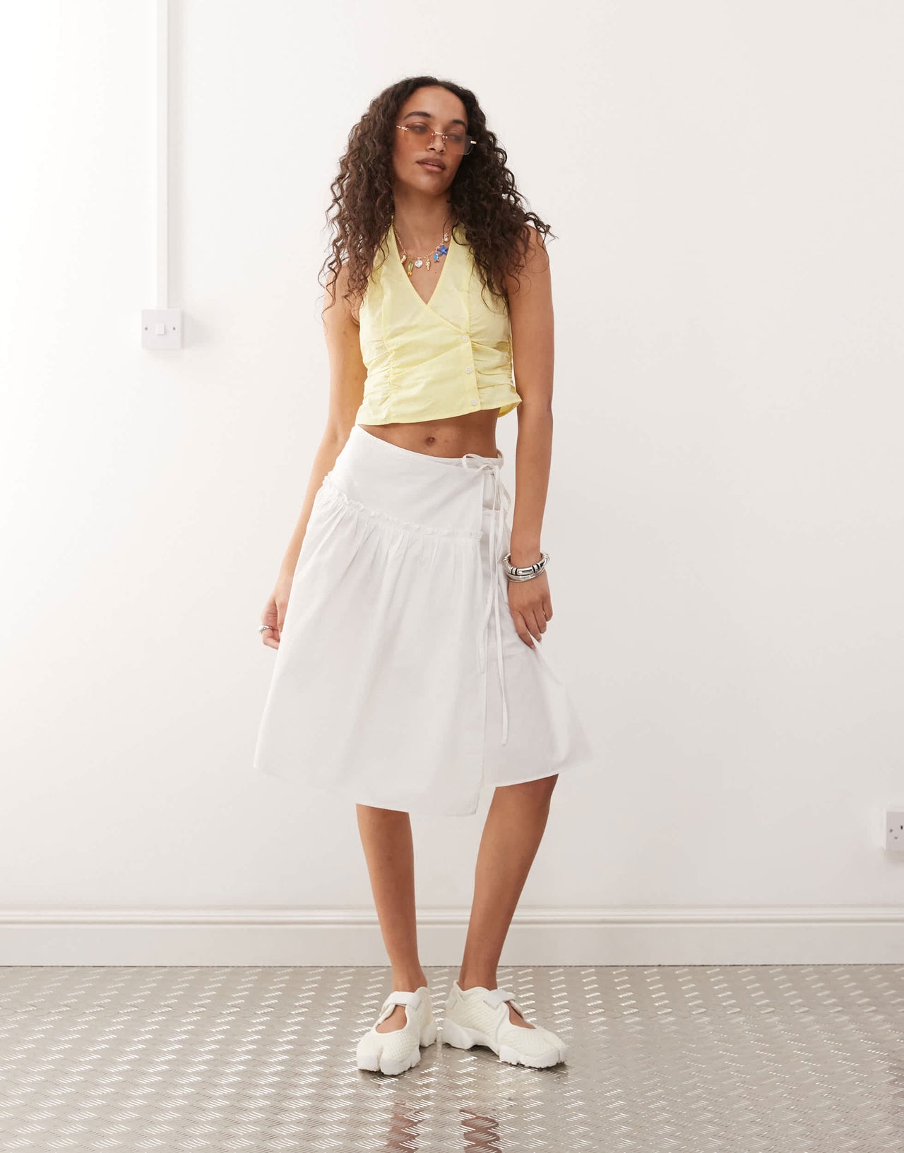 Monki halter neck wrap top with ruched sides in pale yellow