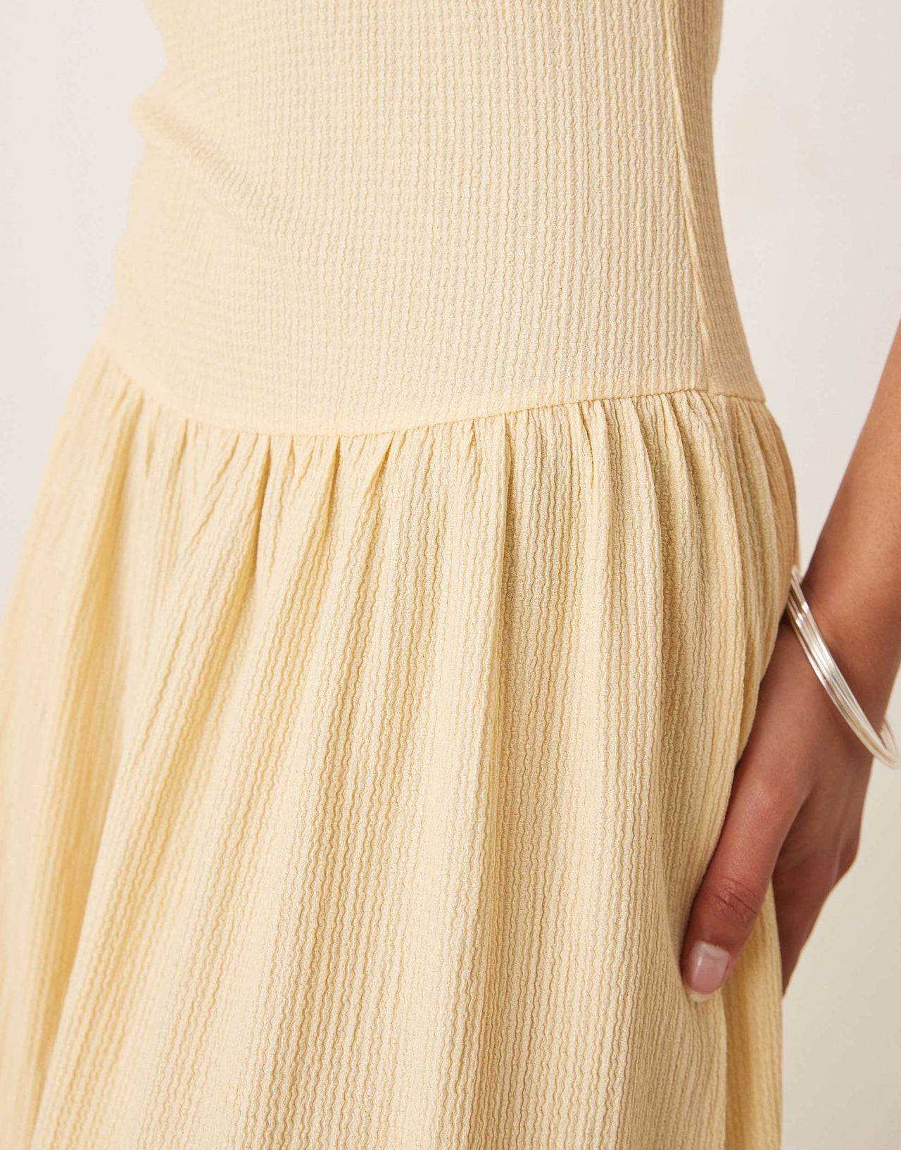 ASOS DESIGN textured maxi dress with dropped waist in buttermilk