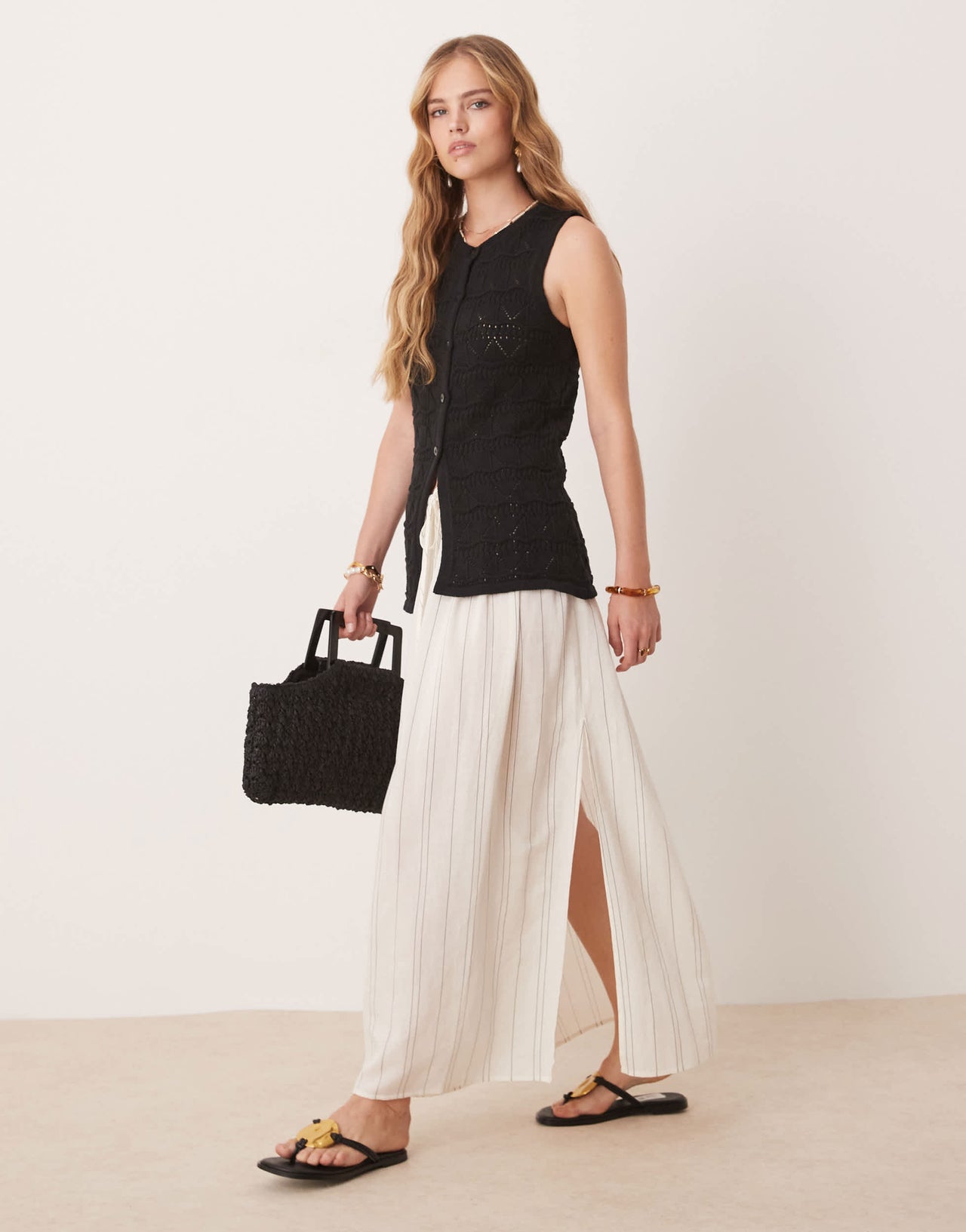 ASOS DESIGN knitted lace stitch waistcoat in black