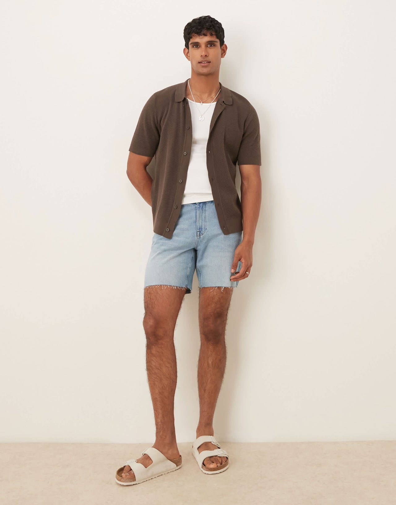 ASOS DESIGN mid length slim denim shorts in light wash blue