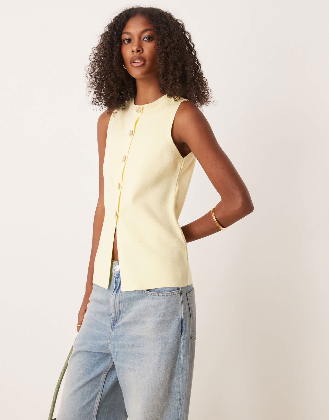 ASOS DESIGN knitted crew neck structured waistcoat with gold buttons in buttermilk