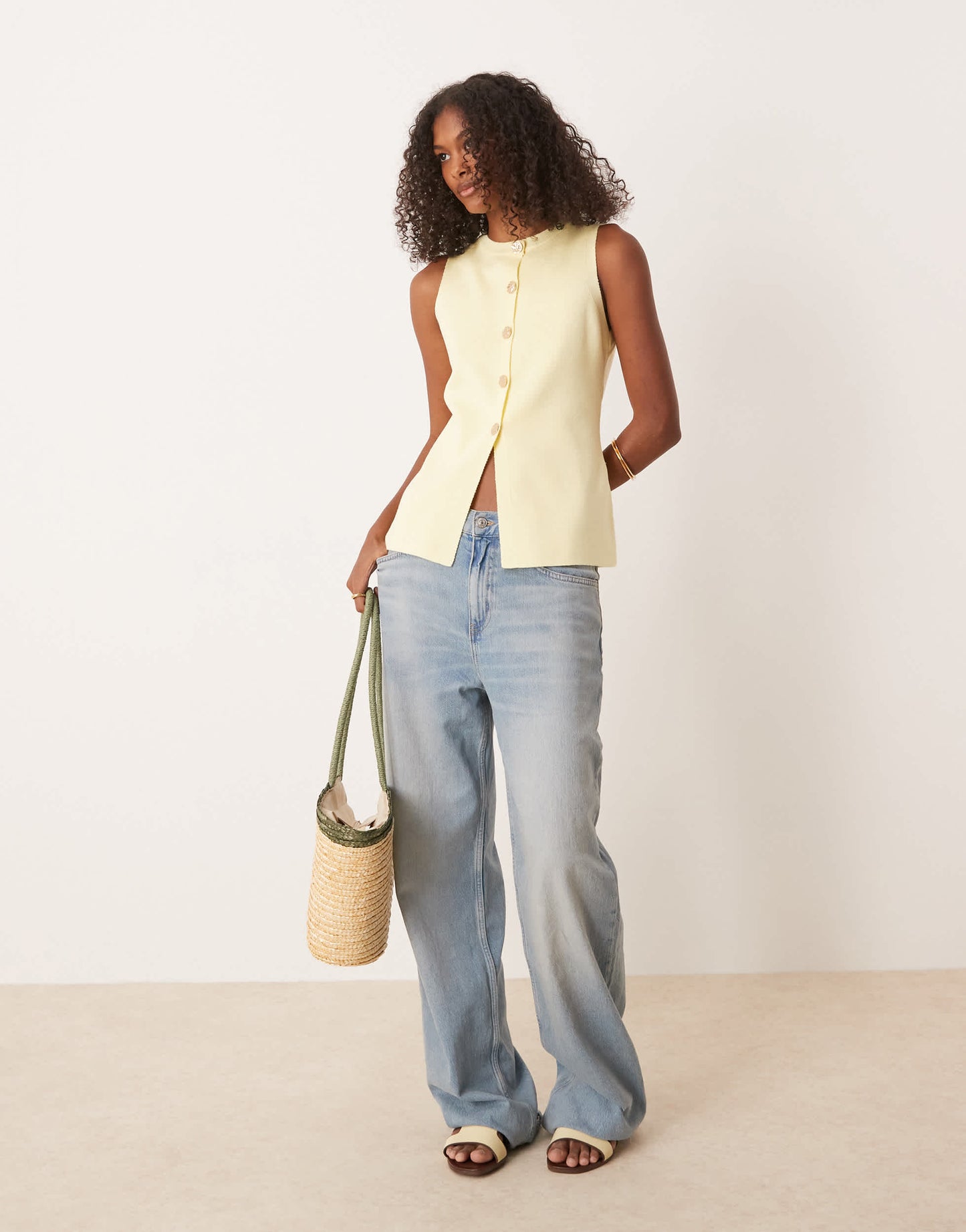 ASOS DESIGN knitted crew neck structured waistcoat with gold buttons in buttermilk