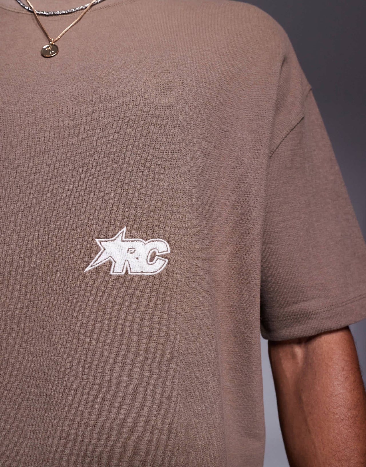 Bershka arc t-shirt in brown