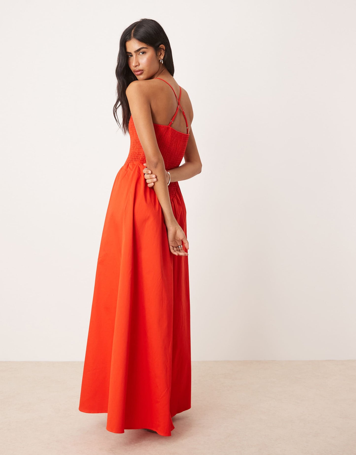 ASOS DESIGN scoop neck crinkle maxi sundress with cross back in bright red