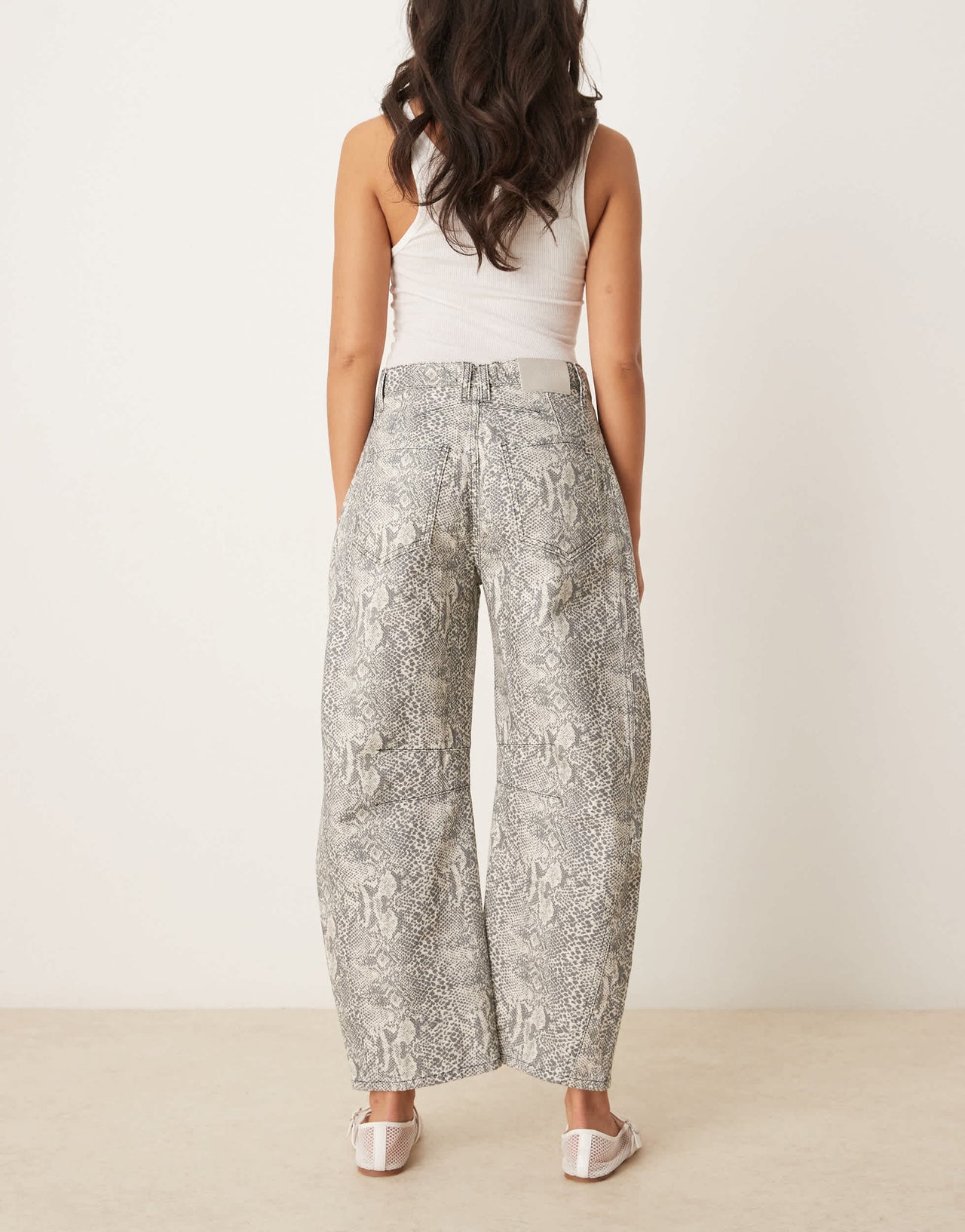 Free People good luck printed barrel jean in snake combo