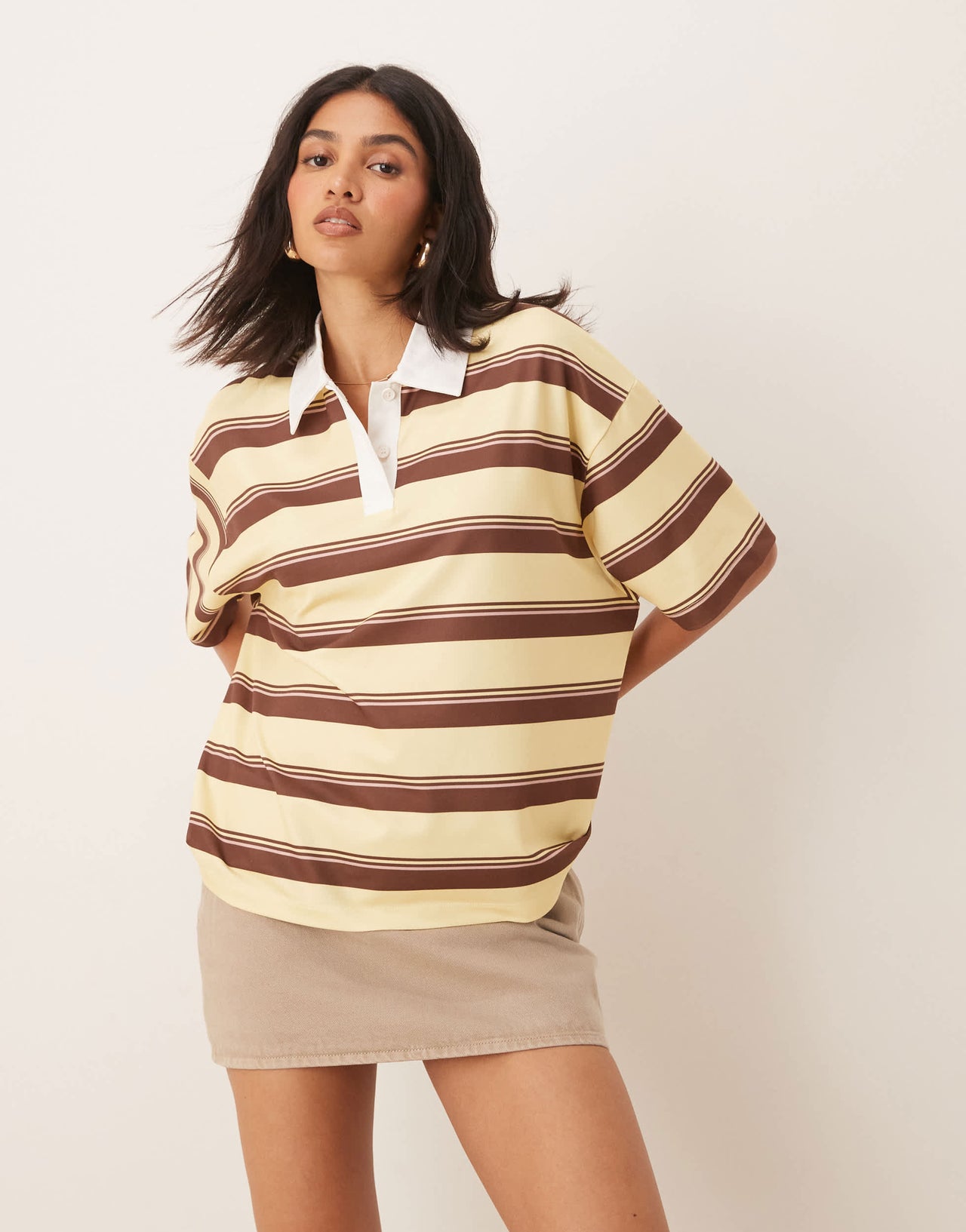 ASOS DESIGN short sleeve rugby collar tee in yellow stripe
