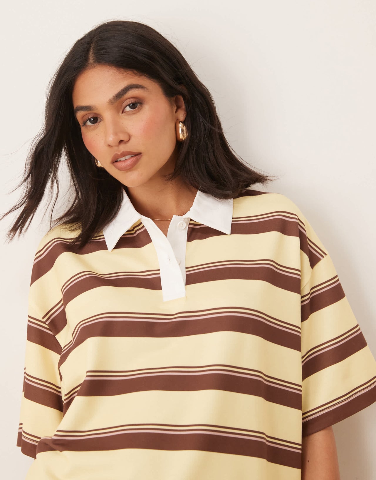 ASOS DESIGN short sleeve rugby collar tee in yellow stripe