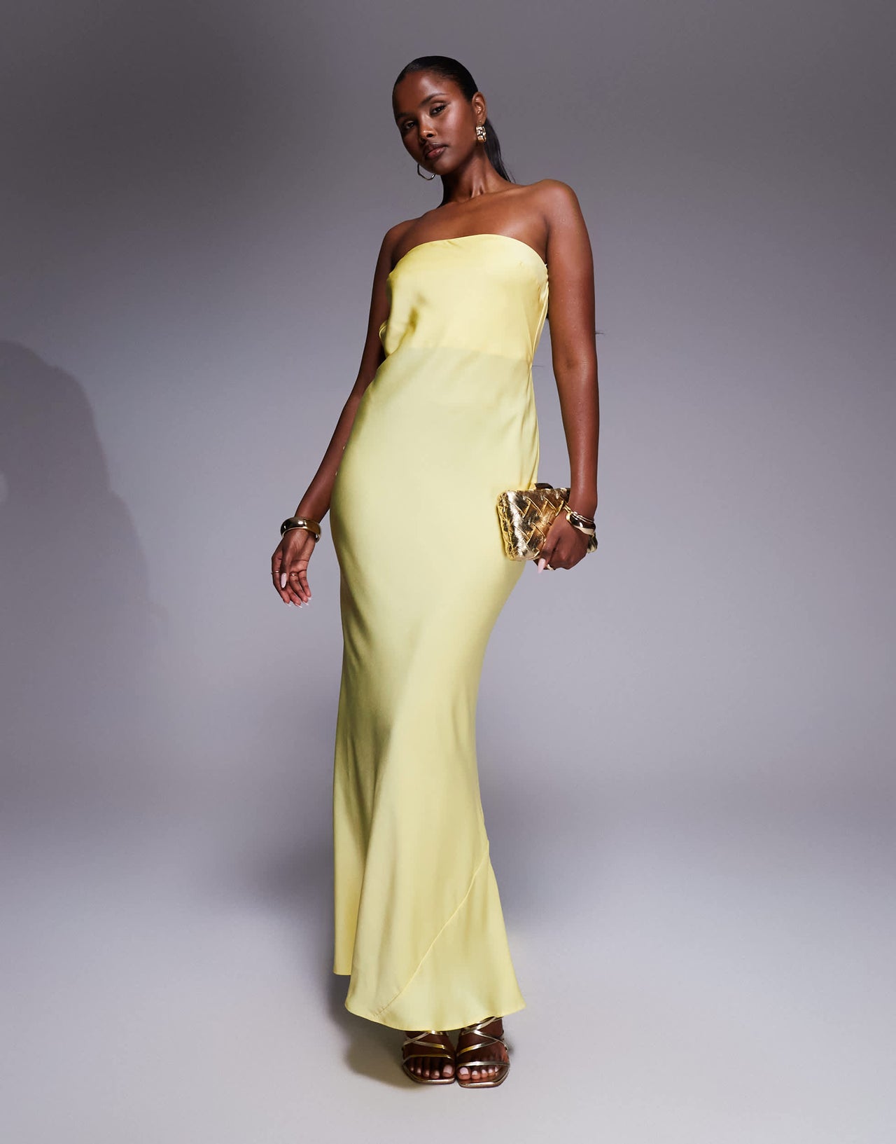 ASOS DESIGN satin trapeze bandeau maxi dress with bow back detail in buttermilk
