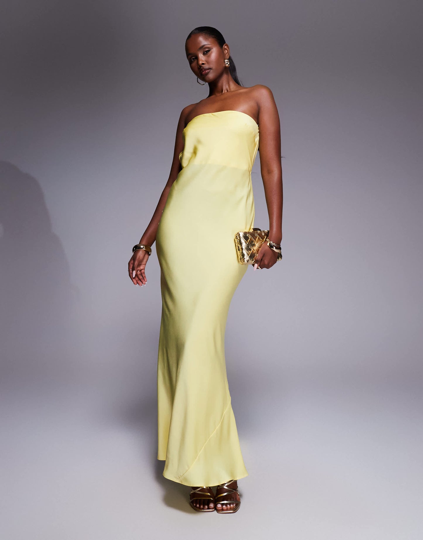 ASOS DESIGN satin trapeze bandeau maxi dress with bow back detail in buttermilk