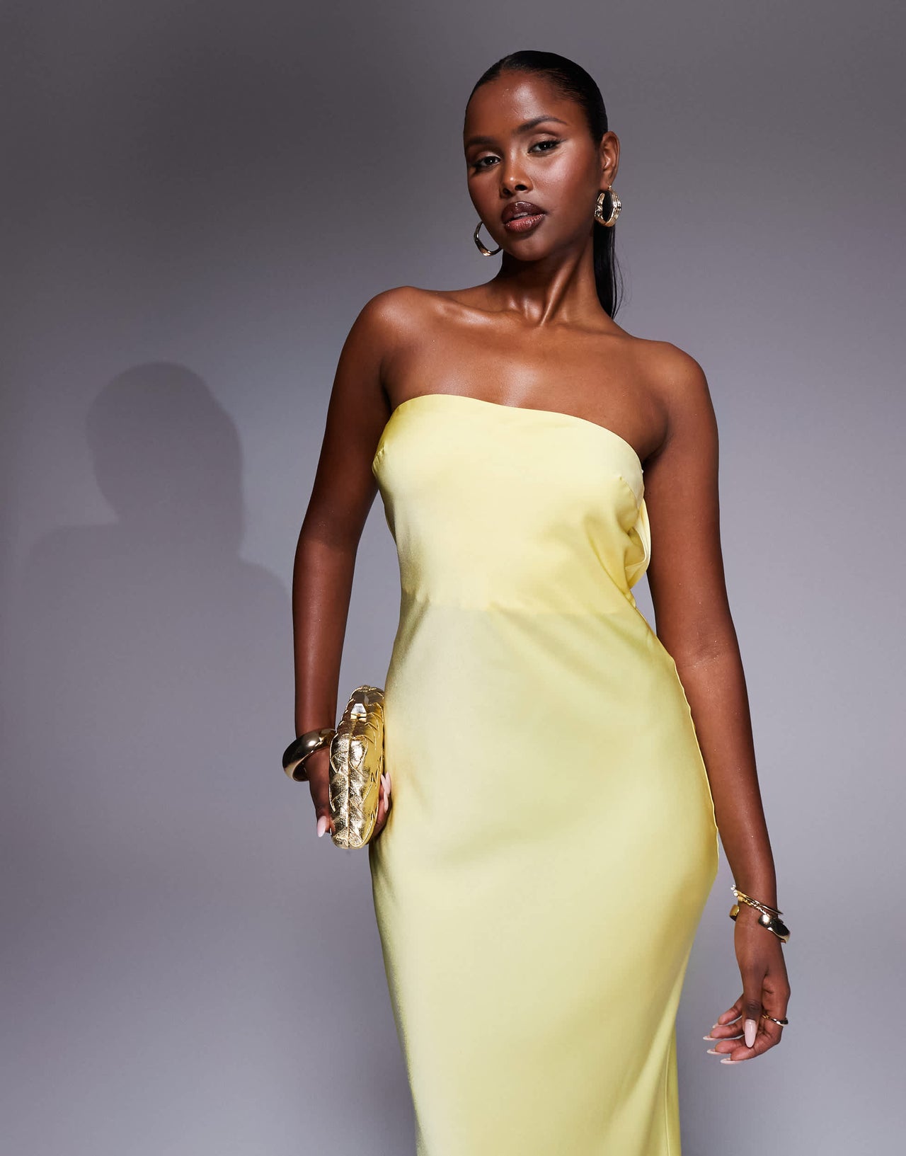 ASOS DESIGN satin trapeze bandeau maxi dress with bow back detail in buttermilk