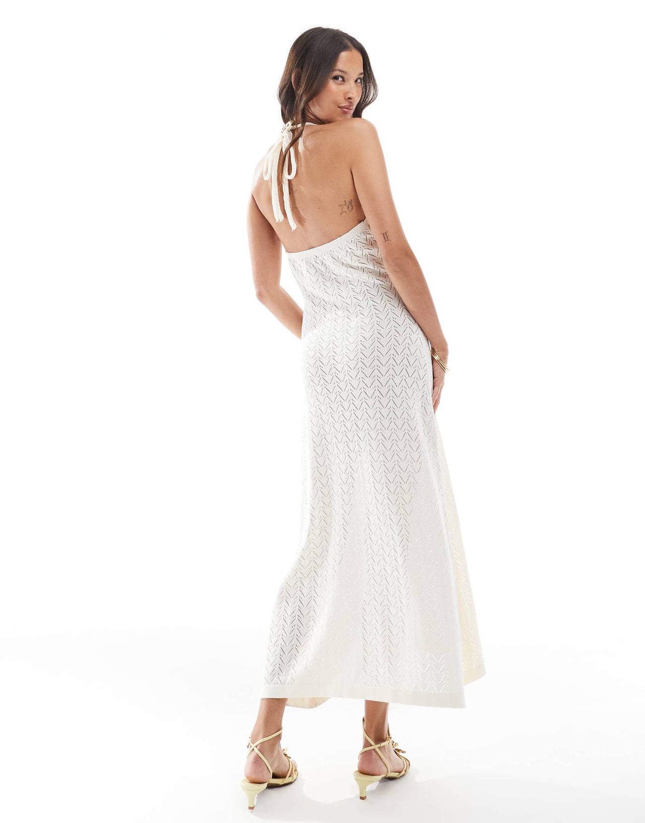 ASOS DESIGN knitted halter maxi dress with gold shell in ecru