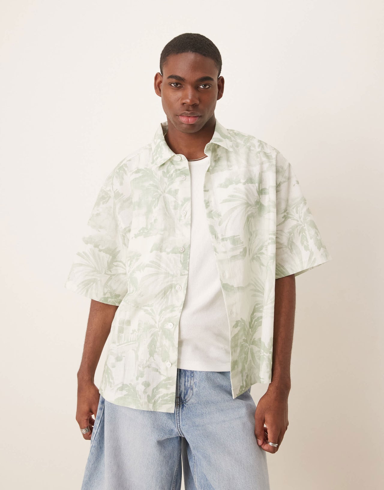 ASOS DESIGN boxy oversized shirt with floral print in green