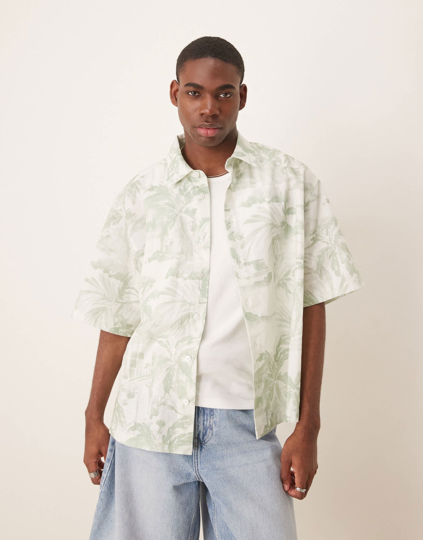 ASOS DESIGN boxy oversized shirt with floral print in green