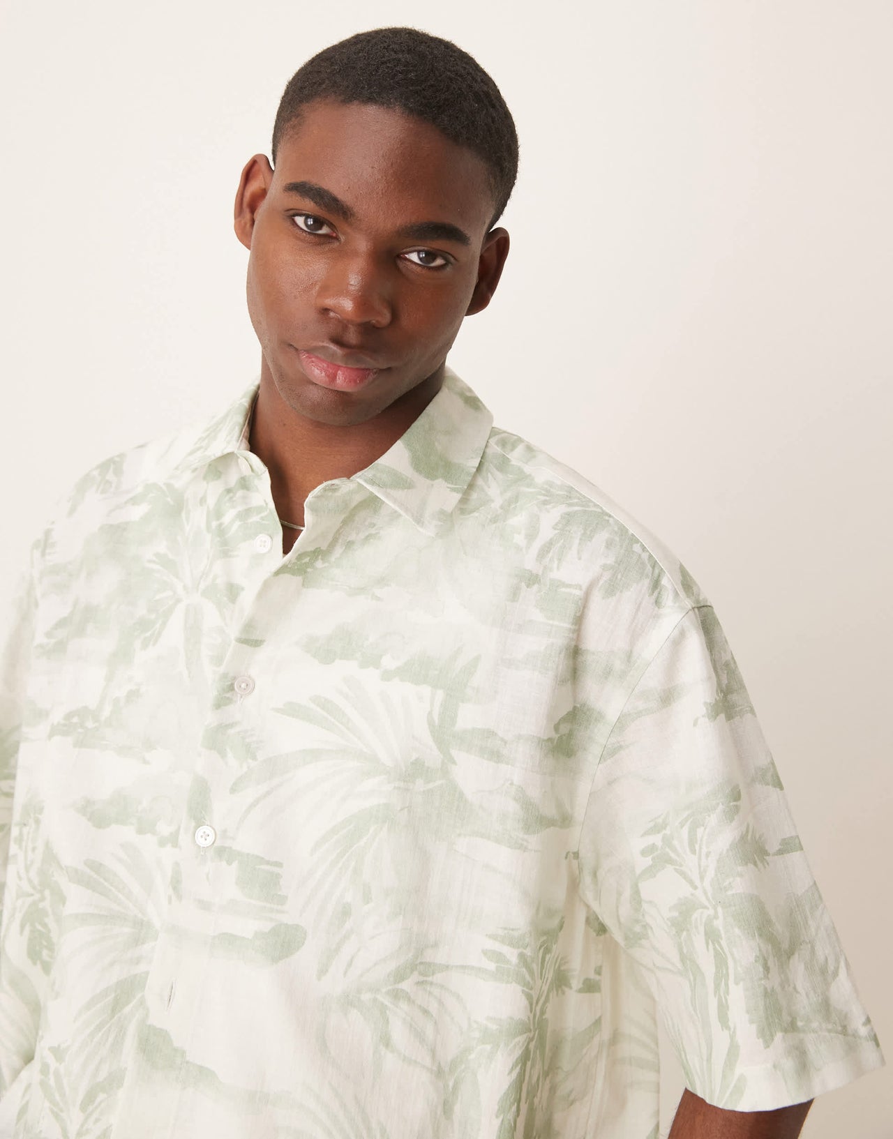 ASOS DESIGN boxy oversized shirt with floral print in green