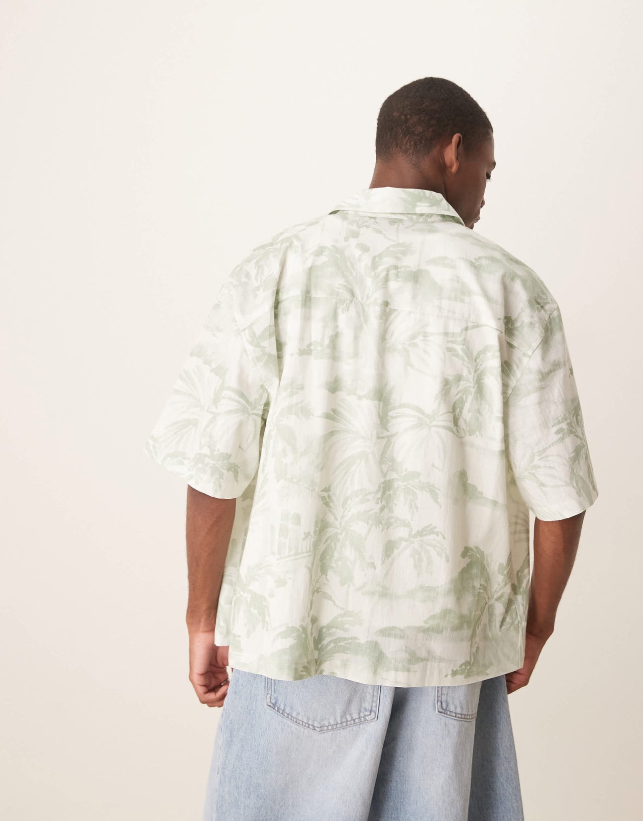 ASOS DESIGN boxy oversized shirt with floral print in green
