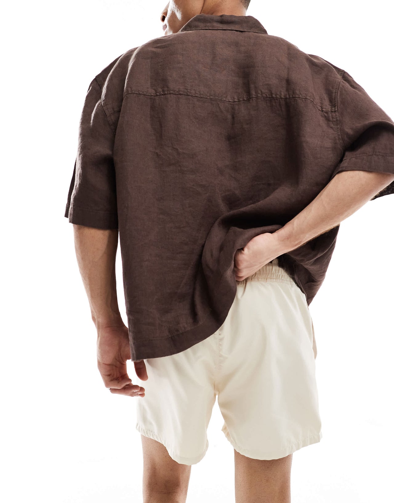 ASOS DESIGN swim shorts in short length in beige