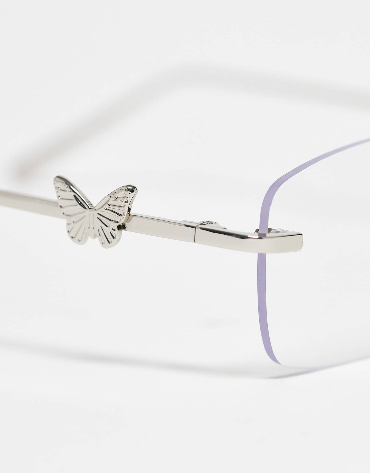 Kaiia exclusive rectangular rimless blue light lens butterfly detail glasses in silver