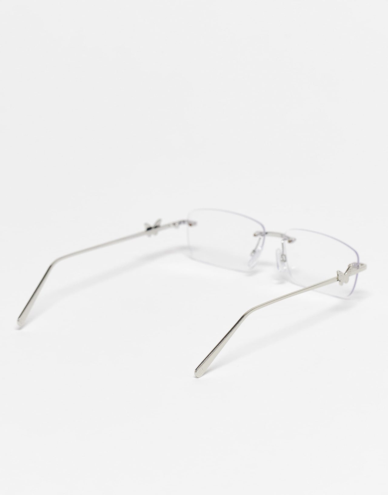Kaiia exclusive rectangular rimless blue light lens butterfly detail glasses in silver