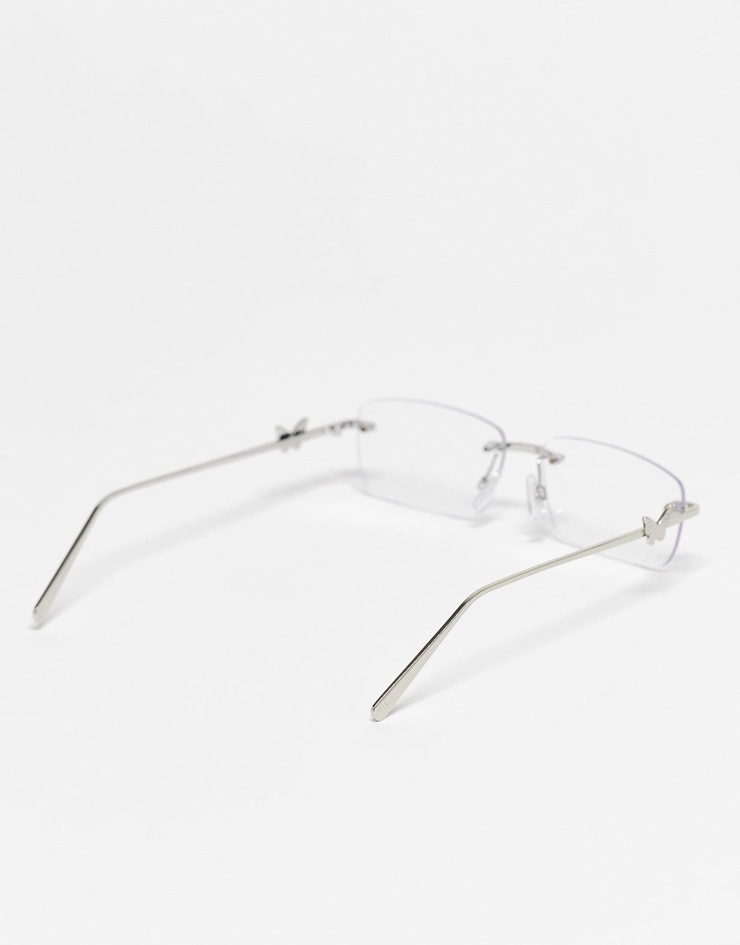 Kaiia exclusive rectangular rimless blue light lens butterfly detail glasses in silver