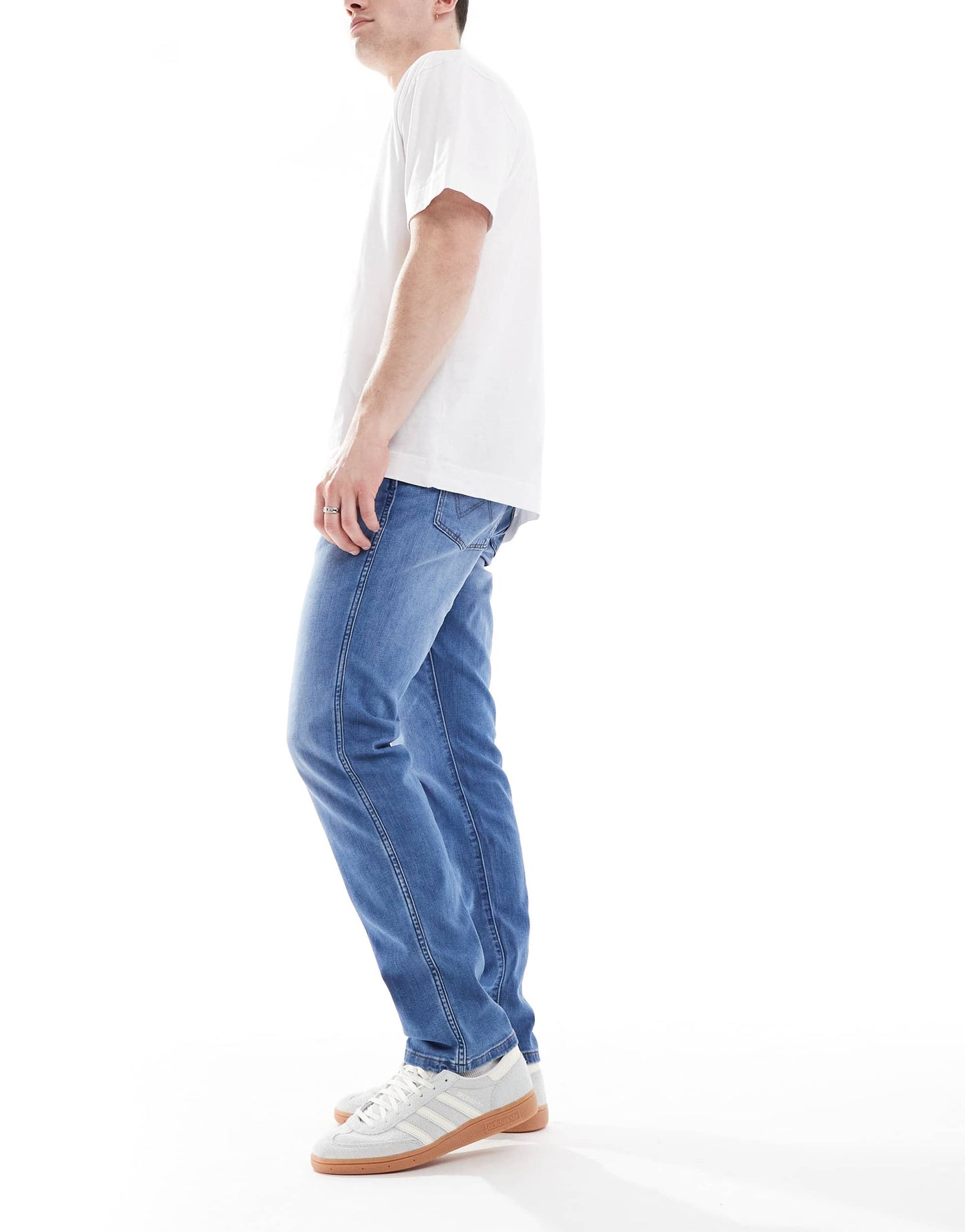 Wrangler Larston slim tapered fit jeans in mid wash blue