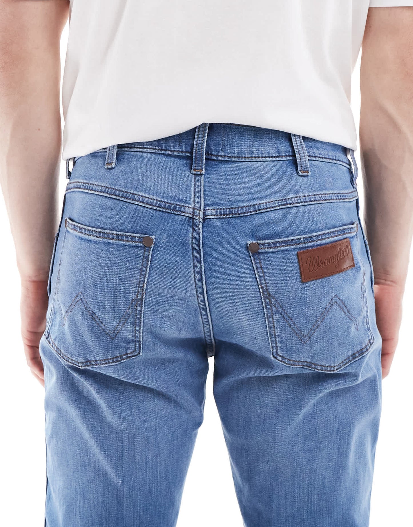Wrangler Larston slim tapered fit jeans in mid wash blue