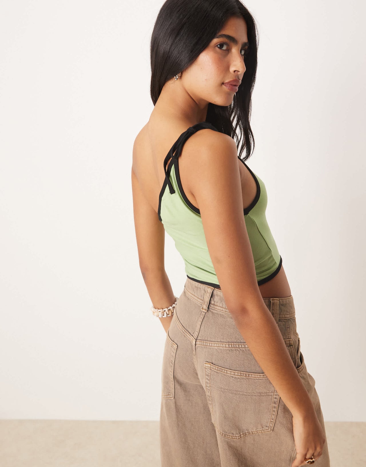 Motel lenti asymmetric top in sage and green