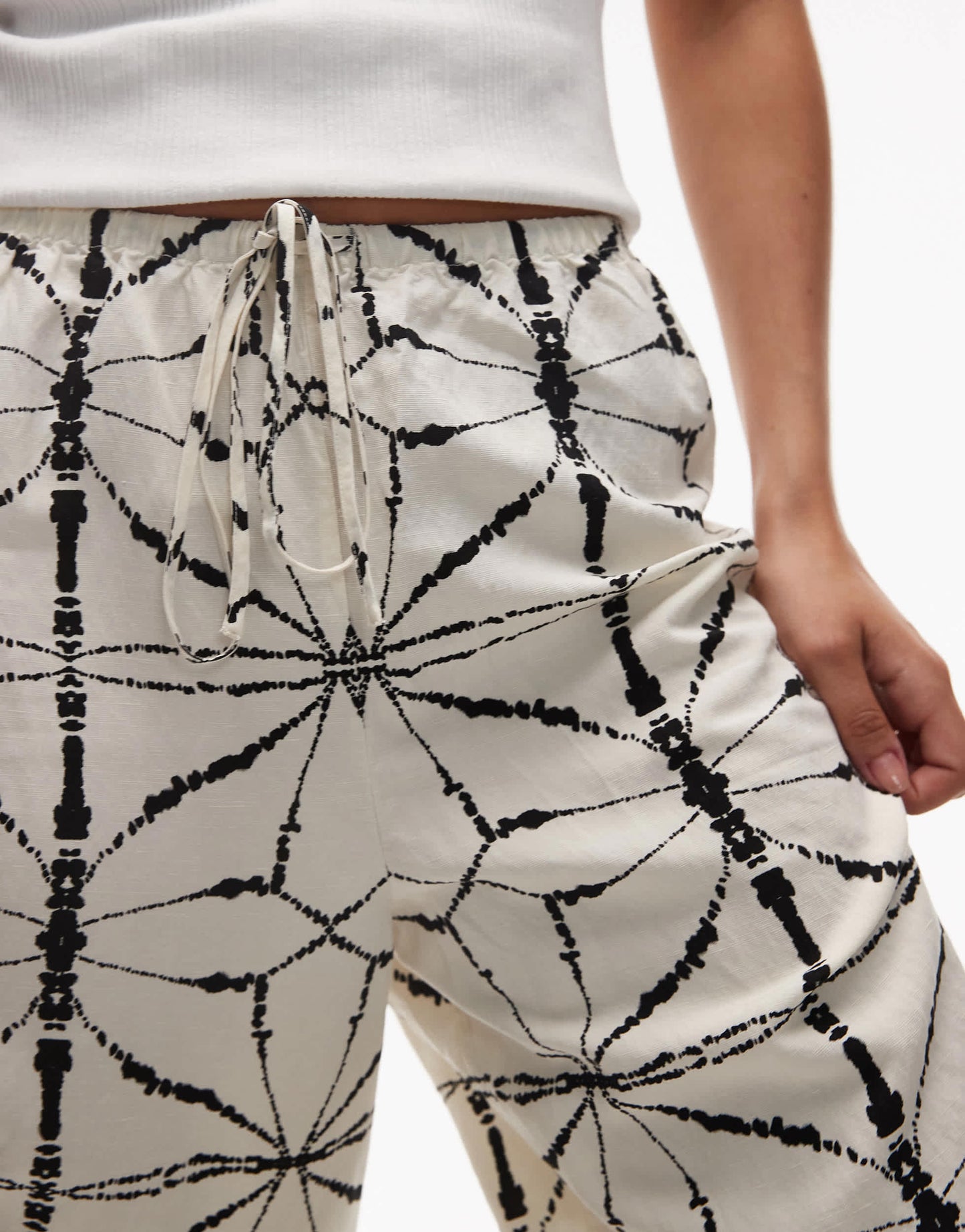 & Other Stories linen wide leg trousers with drawstring waist in off white and black pattern