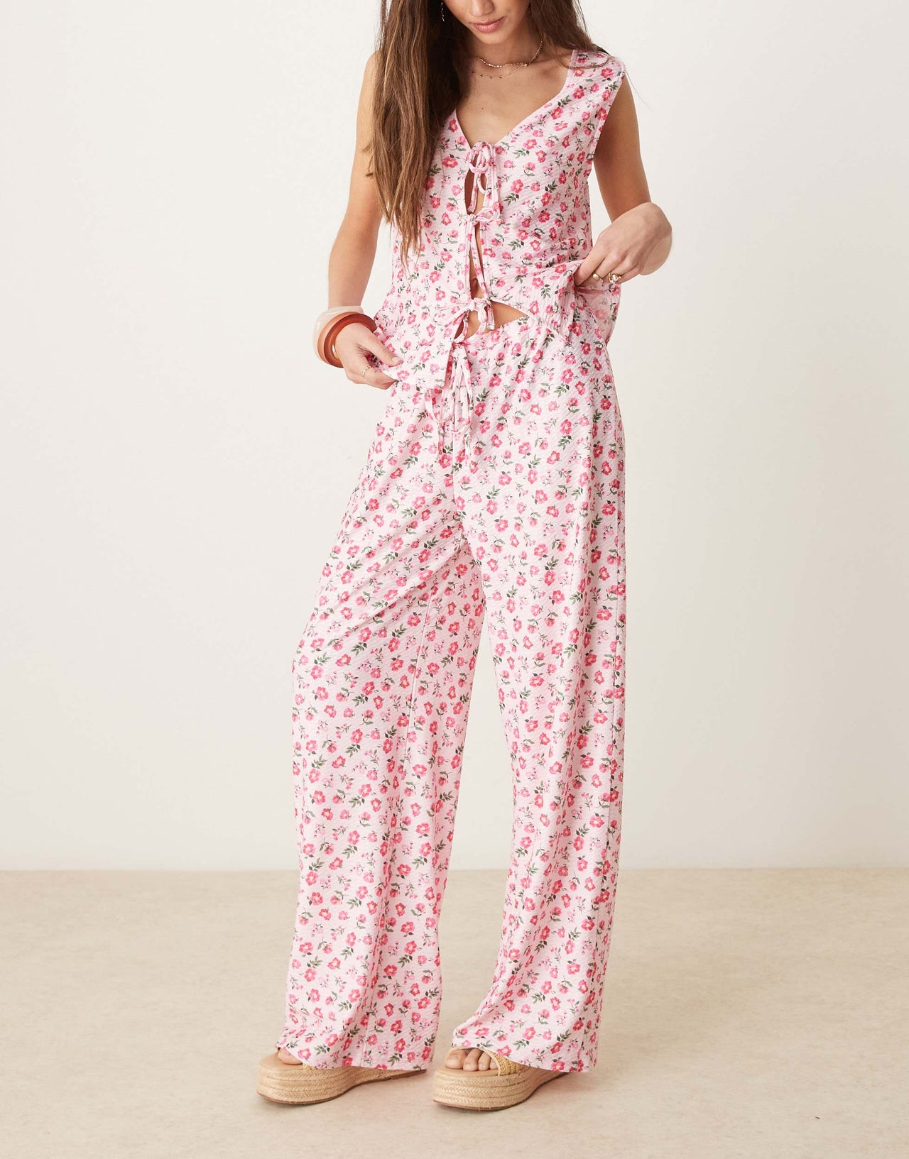 ASOS DESIGN wide leg tie front trouser in pink ditsy floral