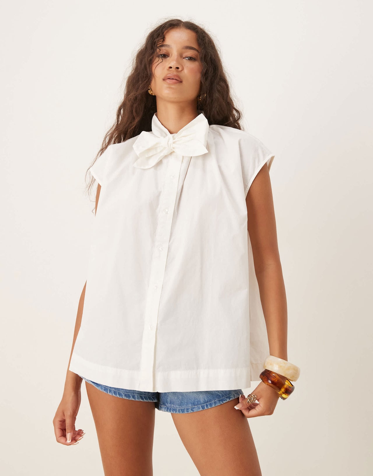 AWARE sleeveless boxy pussybow detail shirt in white