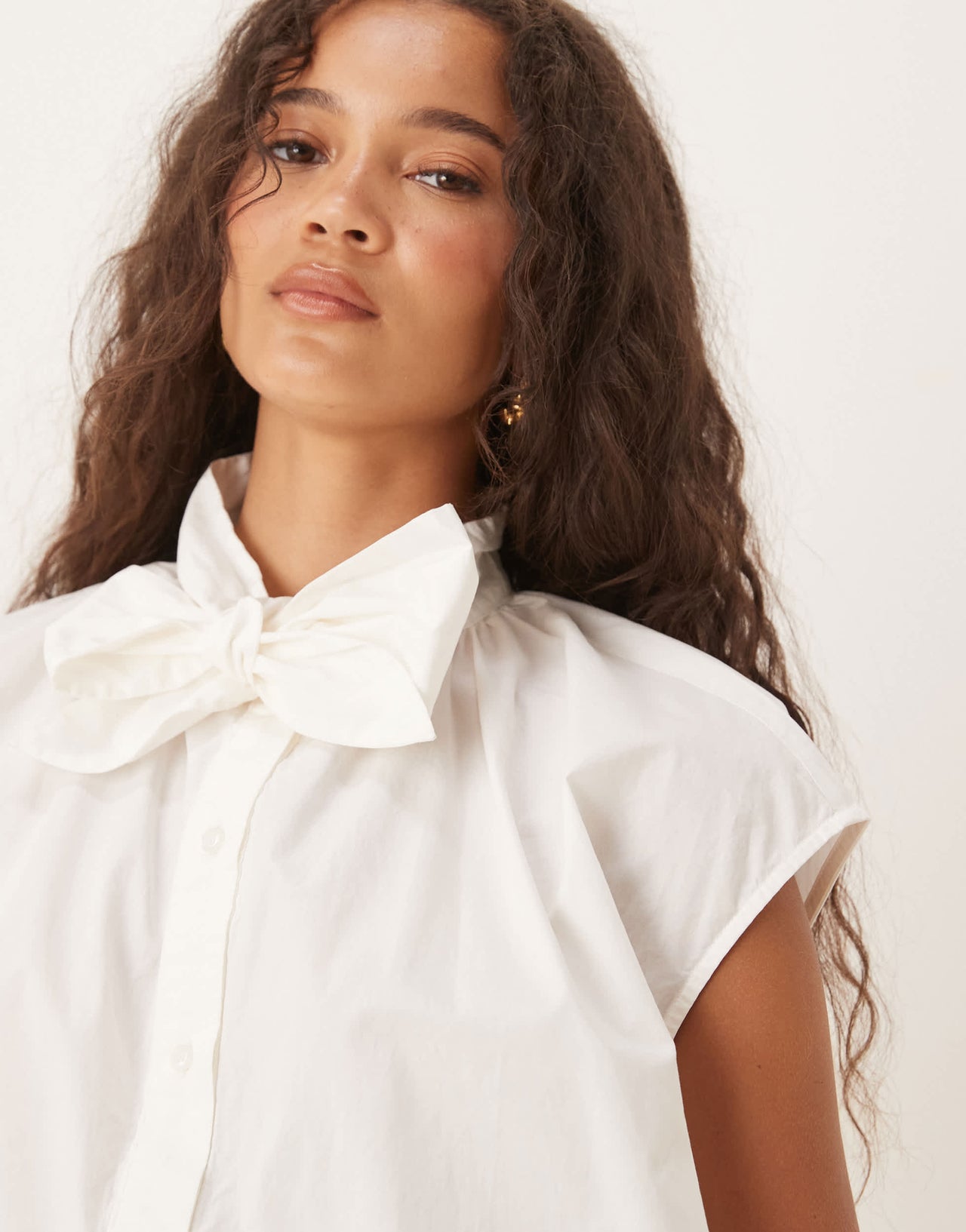 AWARE sleeveless boxy pussybow detail shirt in white