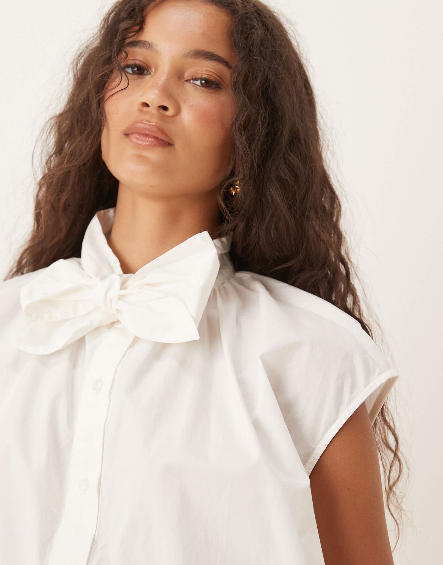 AWARE sleeveless boxy pussybow detail shirt in white