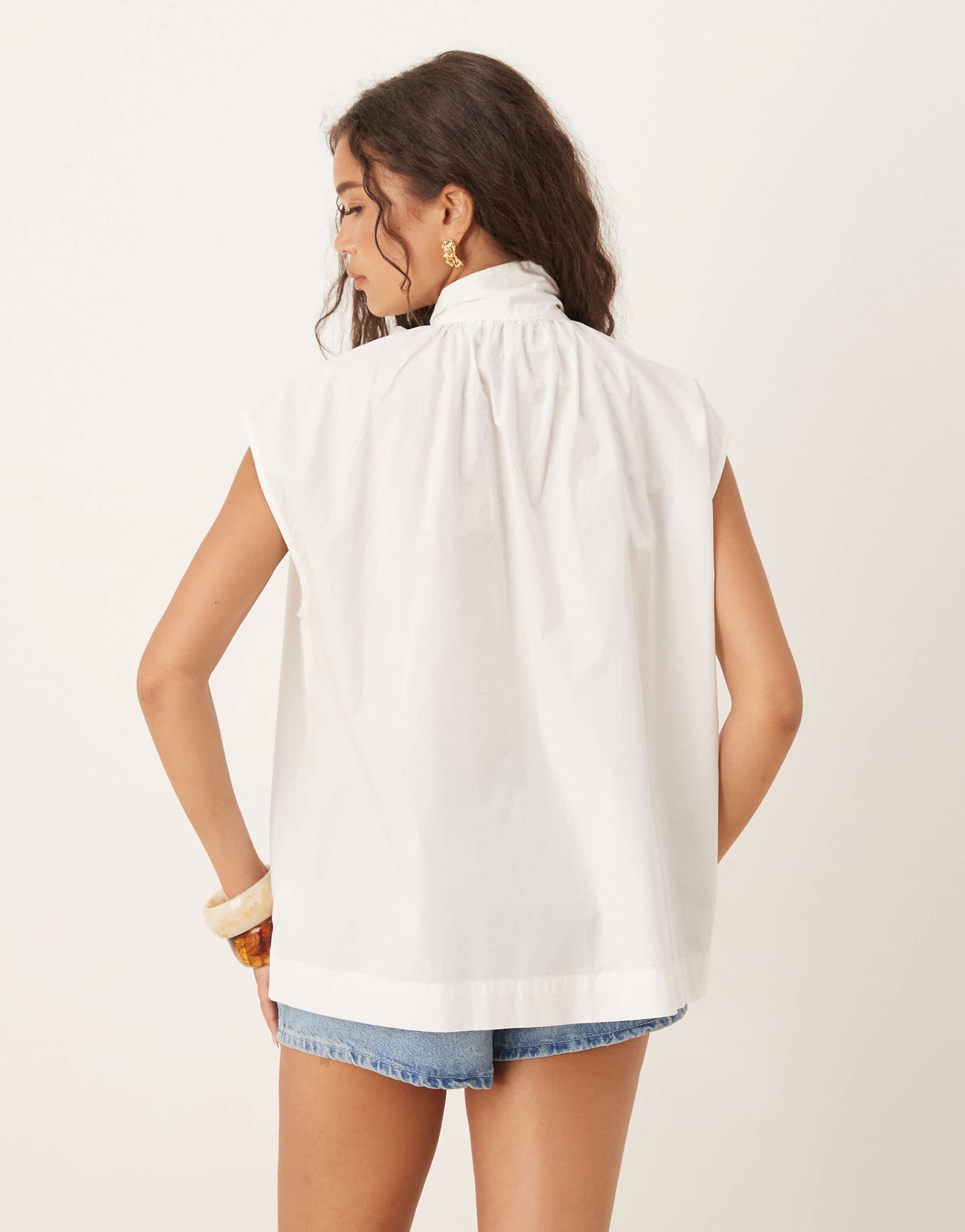 AWARE sleeveless boxy pussybow detail shirt in white