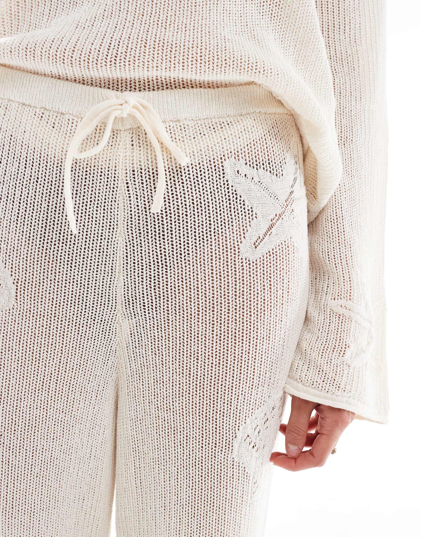 ASOS DESIGN lace knit wide leg trouser with shell motif in ecru