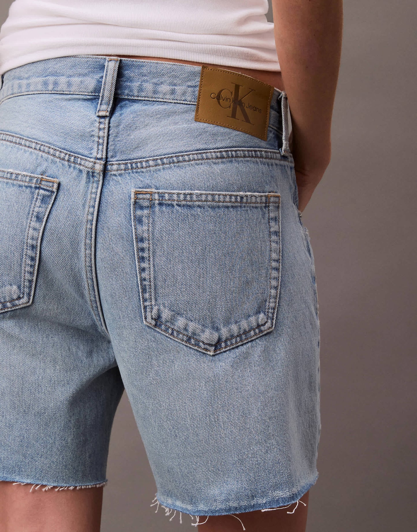 Calvin Klein Jeans signature 90s distressed denim shorts in light blue