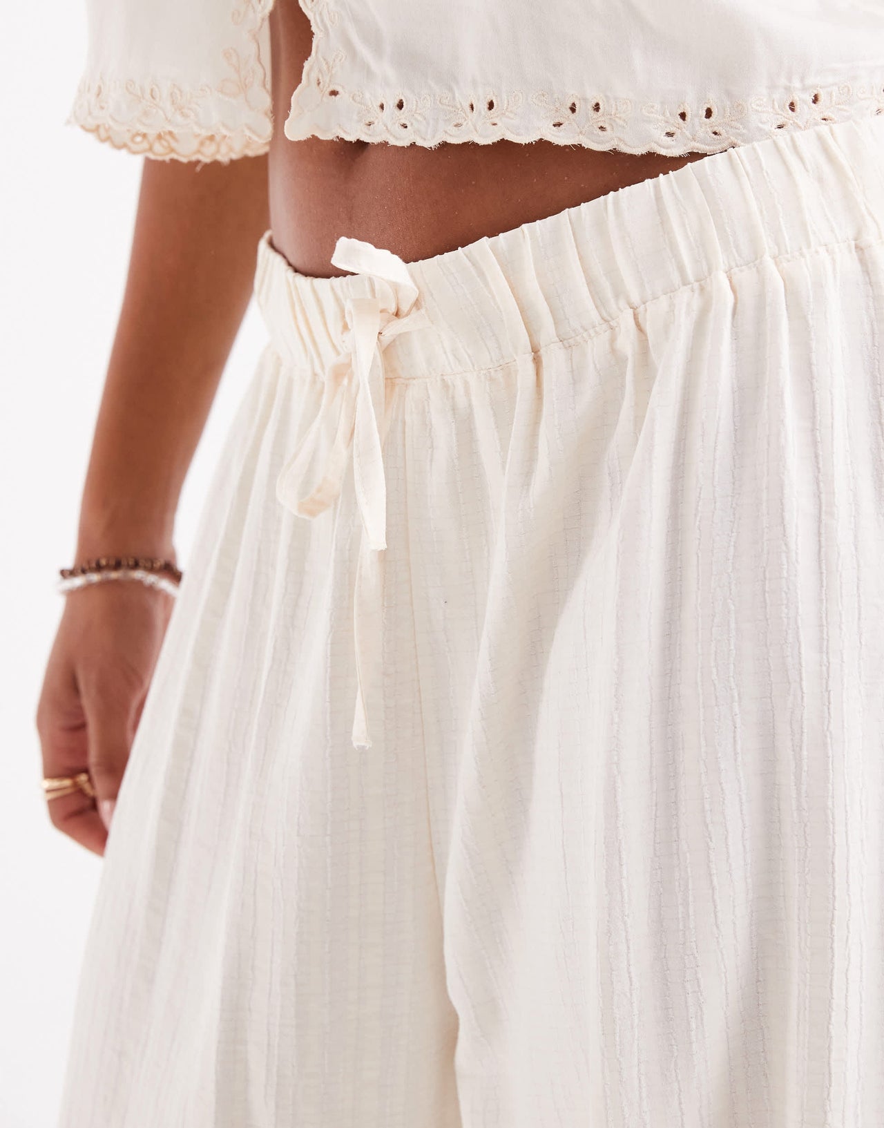 ASOS DESIGN crinkle texture pull on trousers in stone