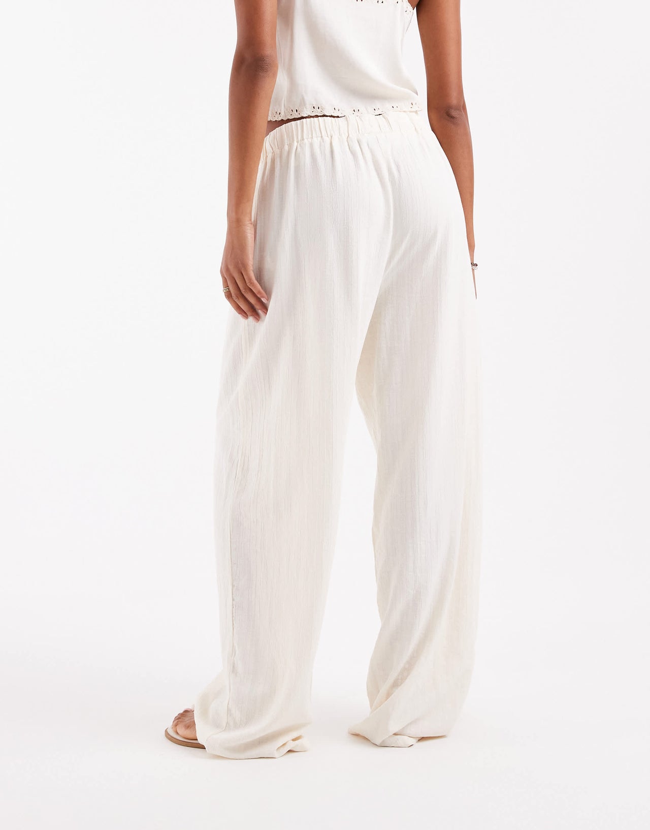 ASOS DESIGN crinkle texture pull on trousers in stone