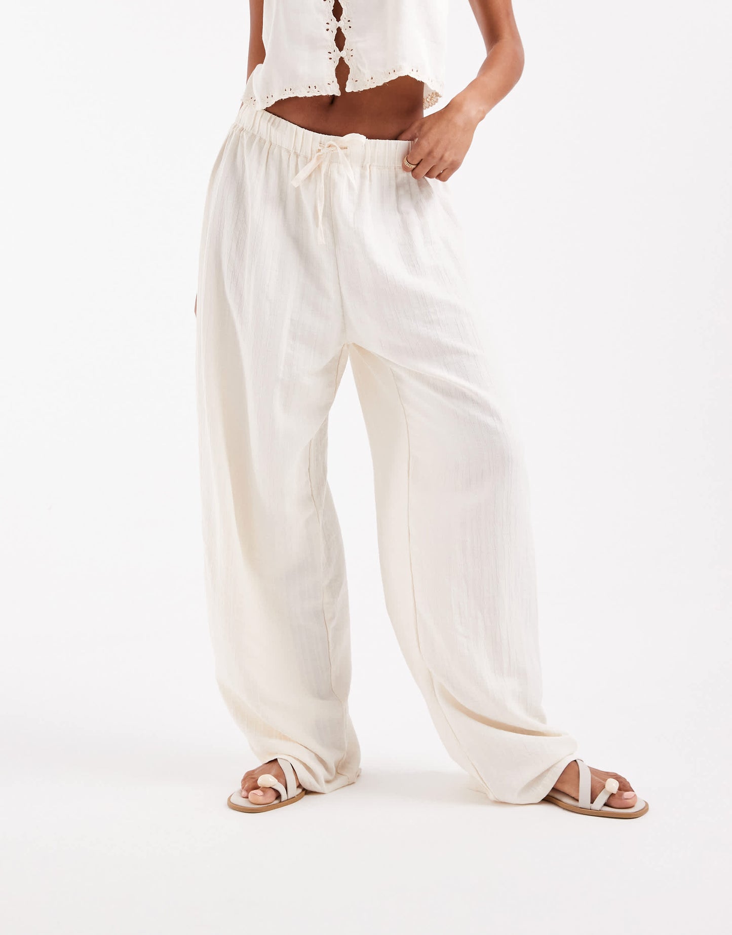 ASOS DESIGN crinkle texture pull on trousers in stone